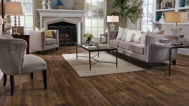 wood look laminate flooring in an elegant living room with fireplace